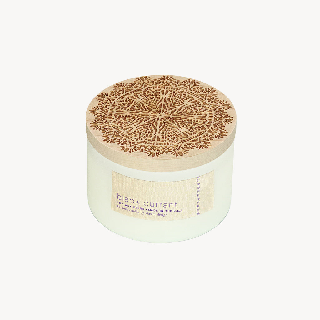Black Currant mixes ripe berries in a rich heady scent that is both sweet and fruity. Contains all-natural oils of Tangerine and Grapefruit. Printing with carved wood blocks is an ancient technique for decorating fabric. These blocks have intricately detailed carvings. These candles are inspired by these print blocks and feature carved maple lids on matte-white, 3-wick vessels, a thoroughly modern interpretation of the originals. Hand poured in the USA with Skeem Designs exclusive soy base.
